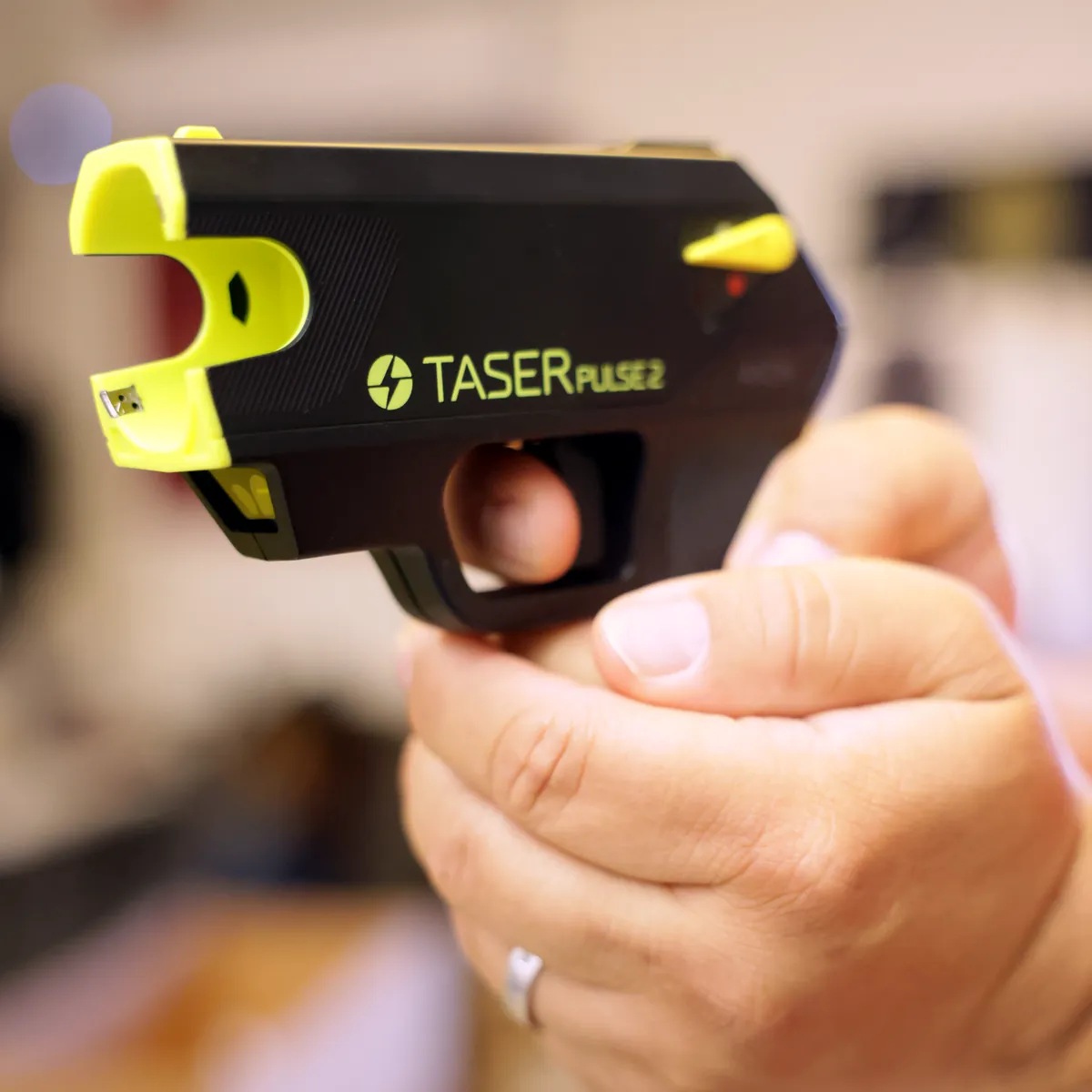 TASER Pulse 2 held in hand