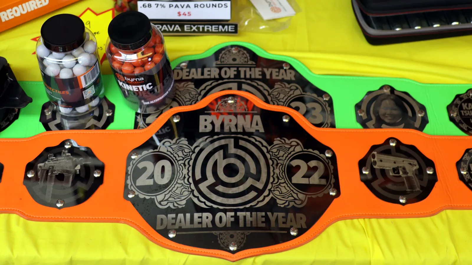 Byrna Dealer of the Year belts displayed in the store