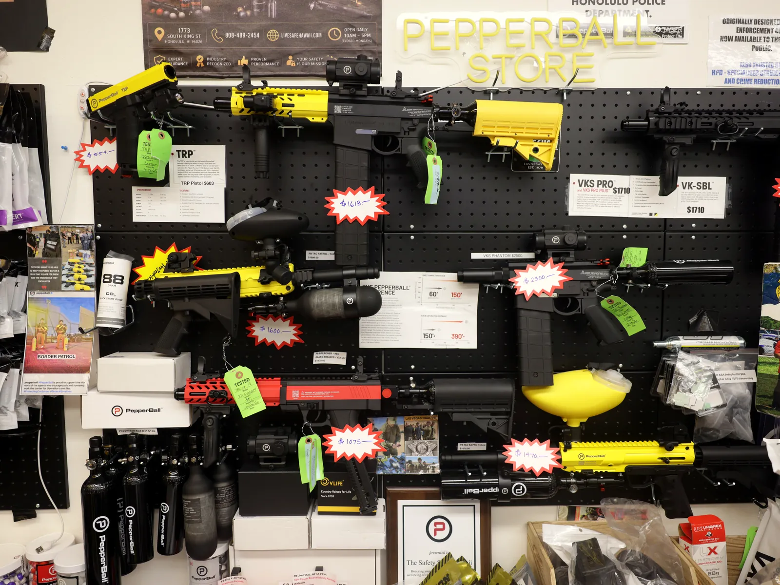 PepperBall launcher wall inside the Honolulu shop